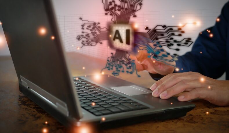 Utilizator care folosește un laptop, cu inteligență artificială și lumini, pentru a ilustra un bărbat care și-a „înviat” prietenul imaginar